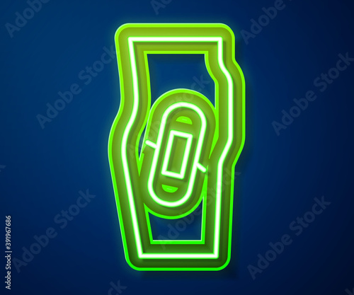Glowing neon line Plaster on leg icon isolated on blue background. Vector.