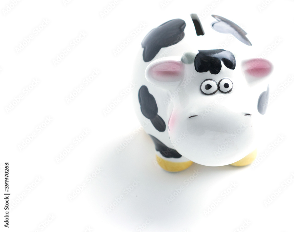 white bull with black spots, symbol 2021, stands on a light background. New Year of the Ox, continuation of the epidemic of 2021, lucky signs of the zodiac white bull with black spots, symbol 2021, stands on a light background. New Year of the Ox, continuation of the epidemic of 2021, lucky signs of the zodiac