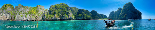 PHI PHI LEH, THAILAND - DECEMBER 24, 2019: Tourists on the boat visit Maya Bay, closed for reef rejuvenation