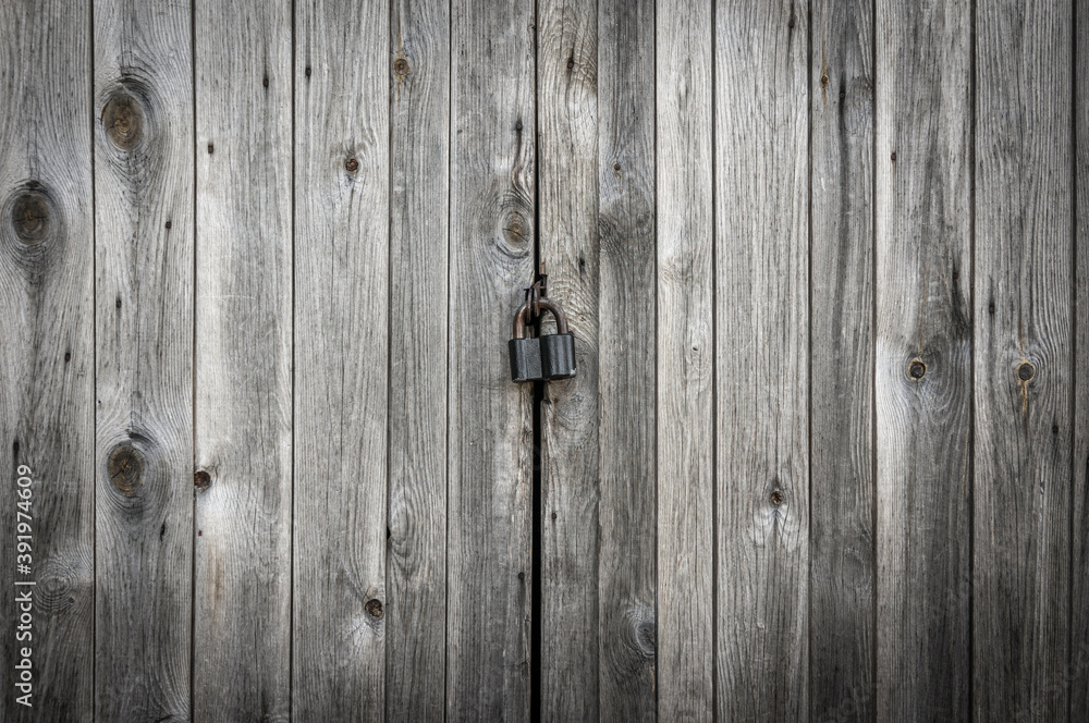 Locked brown old wooden fence Locked brown old wooden fence