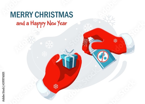 Merry Christmas and Happy New Year horizontal banner template with the hands of Santa in red mittens, holding the present and sanitizer. Celebrating winter holidays amid the coronavirus epidemic