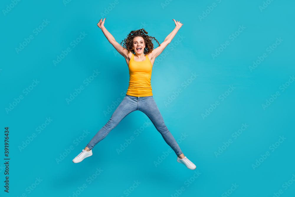 Full length photo of funky lady jump high up rejoice star figure wear casual outfit isolated blue color background