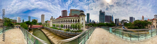Photography KUALA LUMPUR, MALAYSIA - DECEMBER 28, 2019: Tourists along the city streets on a