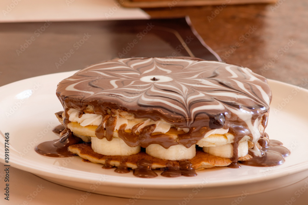 Pancake with chocolate, banana and cream Pancake with chocolate, banana and cream