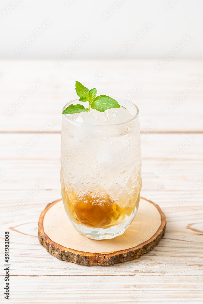 iced plum juice with soda and peppermint iced plum juice with soda and peppermint