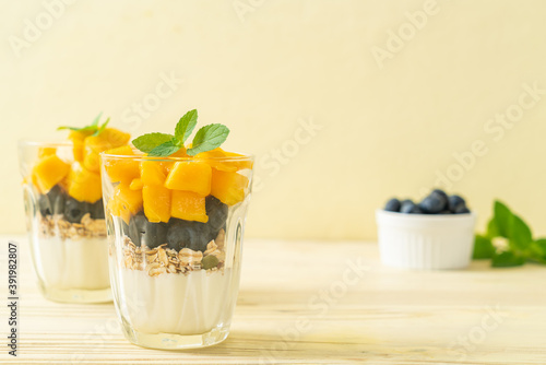 homemade mango and blueberry with yogurt and granola