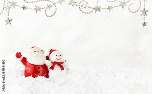 Santa Claus and snowman on ...