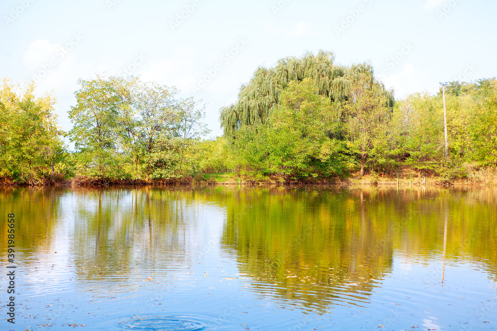 Idyllic scenery with lake . Nature reflection in the river water 