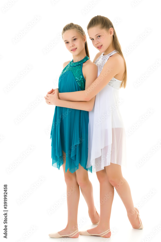 Pretty Girls Gymnasts Performing Rhythmic Gymnastics Exercise. Pretty Girls Gymnasts Performing Rhythmic Gymnastics Exercise.