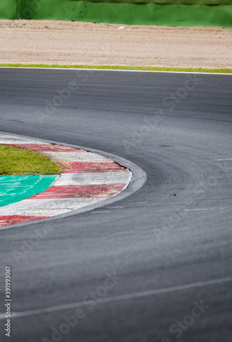Curb close up in motor sport asphalt circuit turn, empty no people