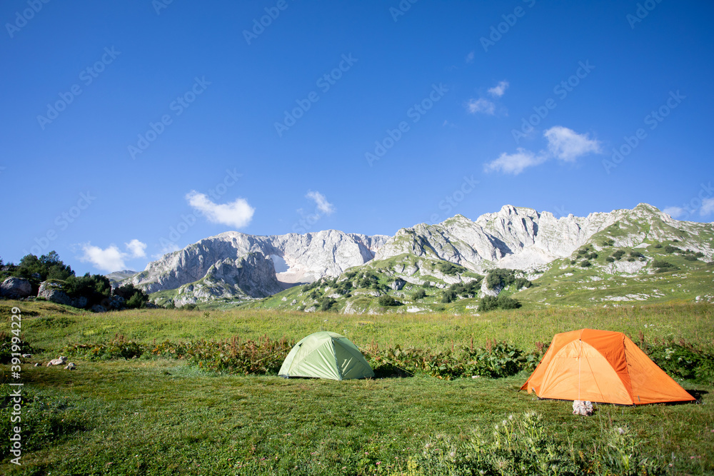 Tents on an alpine meadow in the caucasus mountains