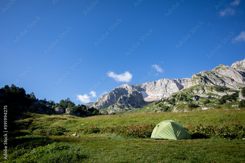 Tents on an alpine meadow in the caucasus mountains