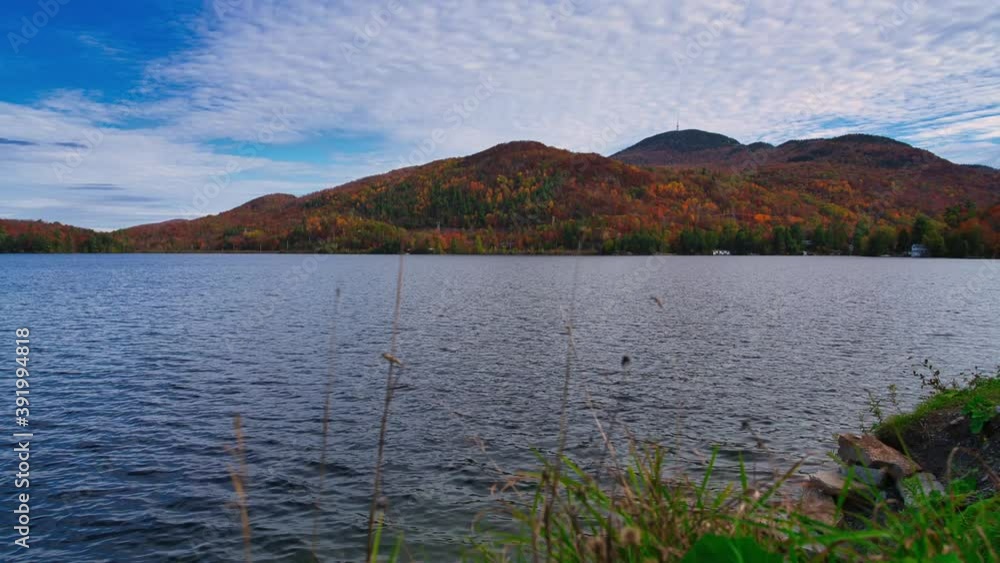 Pan Timelapse by a lake in front of a mountain Pan Timelapse by a lake in front of a mountain