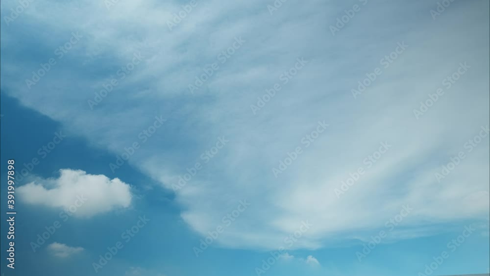 4K sky time lapse, White and blue clouds background. Cloud nature, timelapse of skyscrapers 4K sky time lapse, White and blue clouds background. Cloud nature, timelapse of skyscrapers