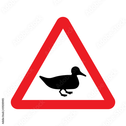 Wildfowl crossing traffic sign.  Vector illustration of red triangle warning road sign with duck icon inside. Livestock likely to be in road ahead. Farm animals symbol isolated on white background.