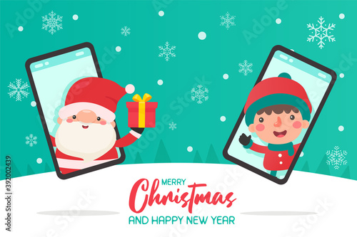 Santa claus coming out of the mobile phone To send gift boxes to children in winter clothes