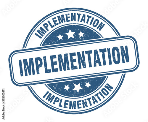 implementation stamp. implementation label. round grunge sign