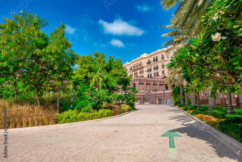 ABU DHABI, UAE - DECEMBER 8, 2016: Abu Dhabi Emirates Palace near Corniche Road on a beautiful sunny day