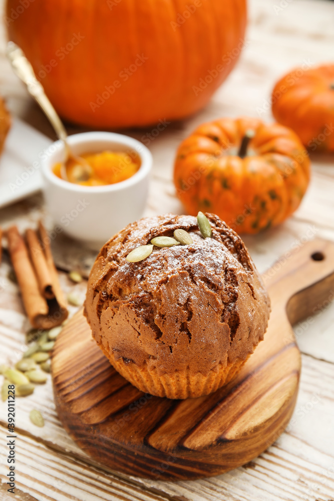 Tasty pumpkin muffin on table Tasty pumpkin muffin on table