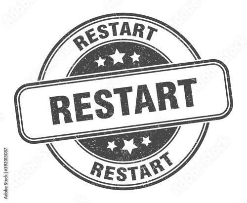 restart stamp. restart label. round grunge sign