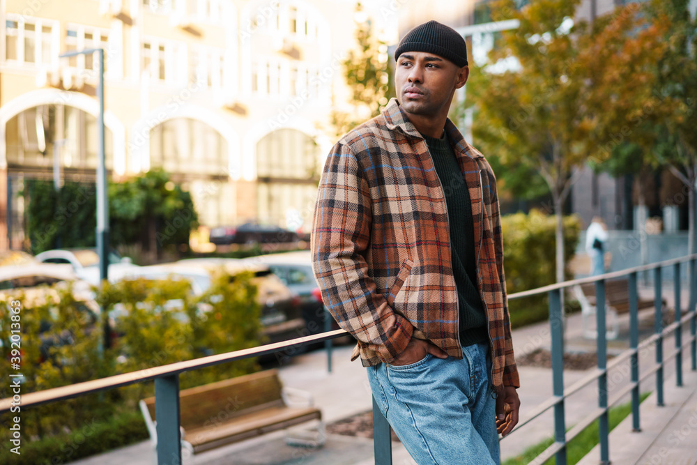 Confident stylish young afro american man walking Confident stylish young afro american man walking