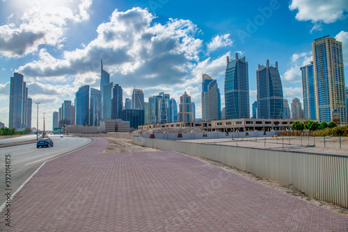 DUBAI, UAE - DECEMBER 10, 2016: Sheikh Zayed road traffic on a beautiful sunny day