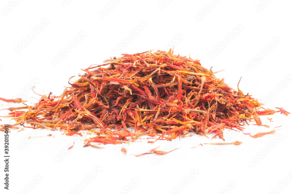 Fototapeta premium Heap of dried saffron spice isolated on white background, spice and herbs concept (Crocus sativus)