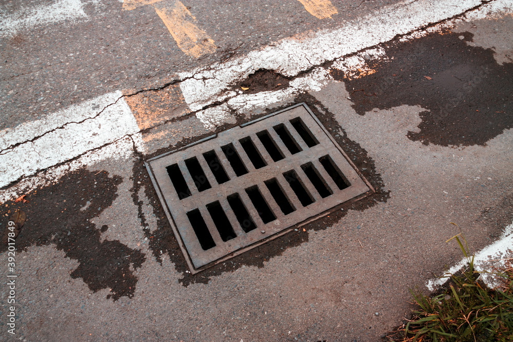 sewerage grid closeup in the city sewerage grid closeup in the city
