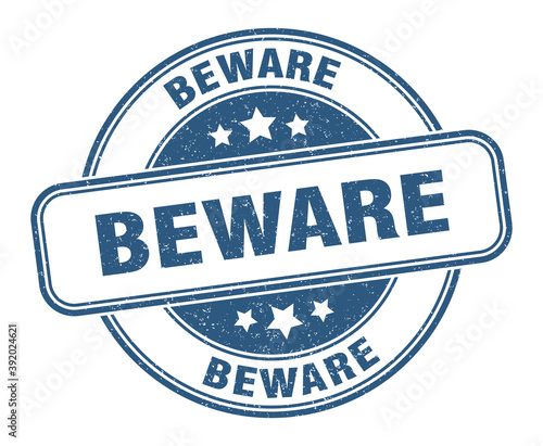 beware stamp. beware label. round grunge sign
