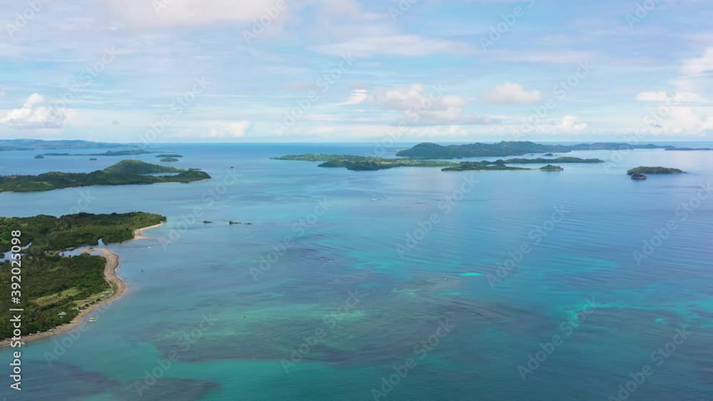 Seascape with islands in the early morning, view from above. Caramoan Islands, Philippines. Seascape with islands in the early morning, view from above. Caramoan Islands, Philippines.