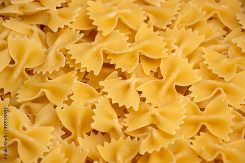 some farfalle pasta forming a background pattern