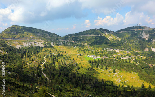 alpine landscape with mountains and coniferous forests in northe