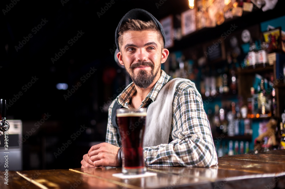 Barman formulates a cocktail on the beerhouse