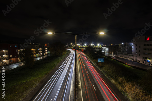 Canvas Print Night timelapse or nightlapse of a motorway in stockholm during cloudy night