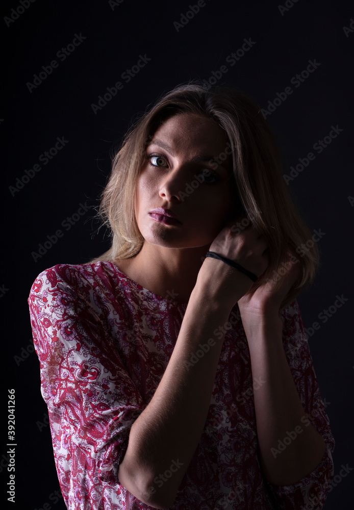 portrait of a young woman, shooting in a photo studio portrait of a young woman, shooting in a photo studio
