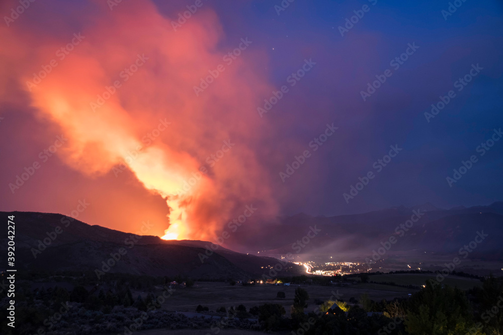 Smoke emitting from wildfire in forest at night Smoke emitting from wildfire in forest at night