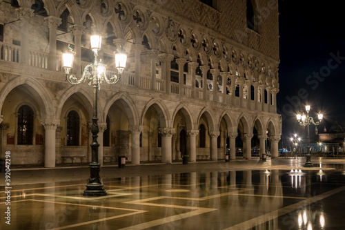 Palazzo Ducale (Doge's Palace) - by night with acqua alta (high water) on San Marco Square in Venice, Venezia © Simone