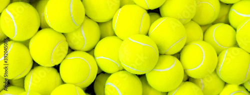 Lots of vibrant tennis balls, pattern of new tennis balls for background © gargantiopa