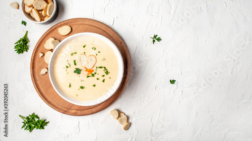panoramic shot of tasty creamy soup with croutons and cheese, diet fresh food meal dish soup lunch, banner, catering menu recipe place for text, top view
