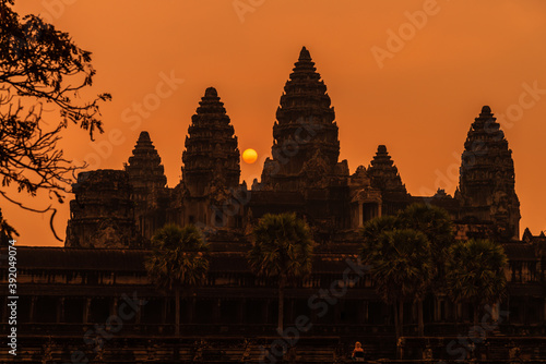 Angkor Wat, Siem Reap, Cambodia. Sunrise from reflection pool showing 5 towers of main temple. photo