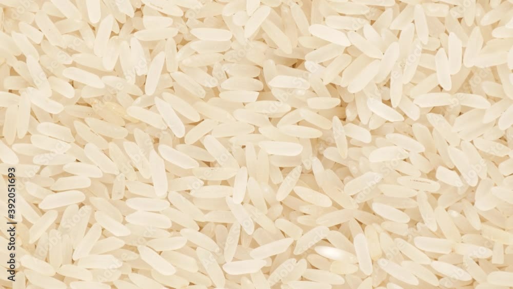 White rice, rotation. Rice, close-up. White rice, rotation. Rice, close-up.