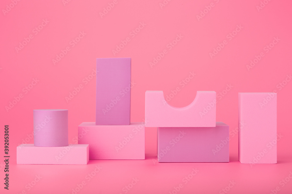 Abstract geometric composition with pink and purple geometrical figures on bright pink background Abstract geometric composition with pink and purple geometrical figures on bright pink background