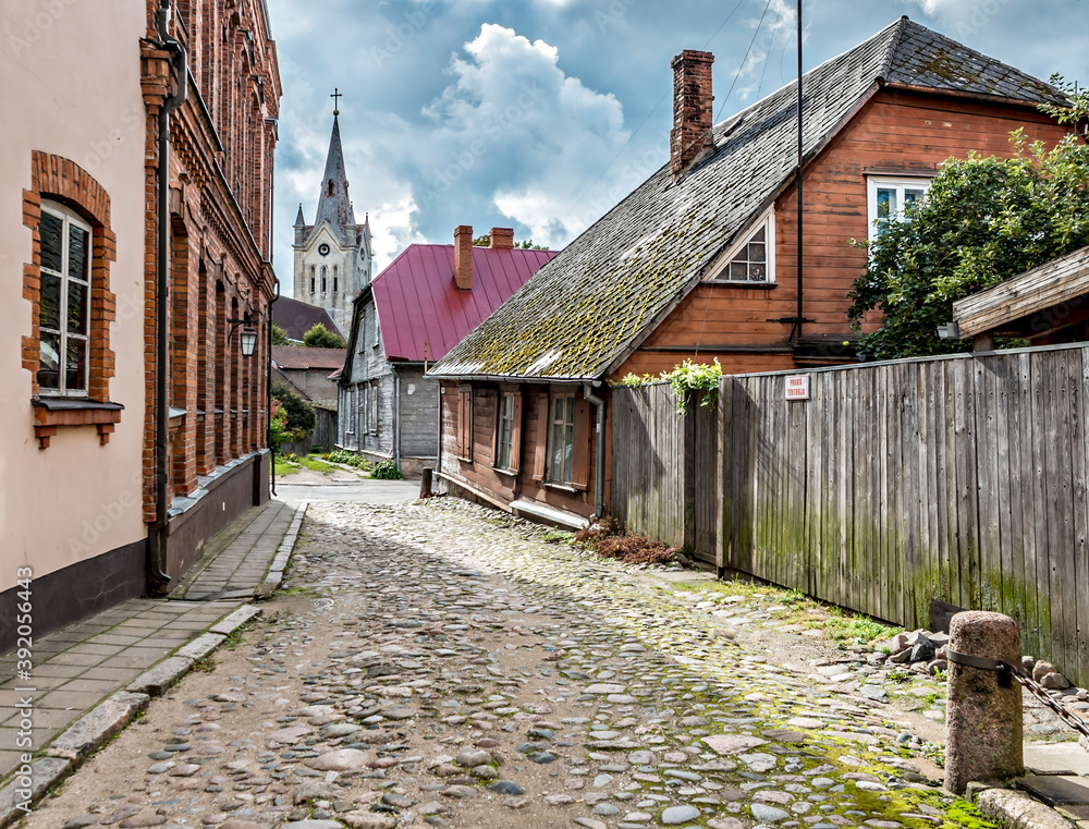 Old narrow street leading to the church, Europe