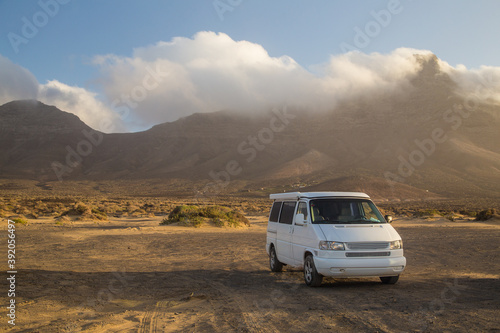 Camper van parked on Cofete beach in Fuerteventura. photo