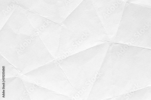 White crumpled paper background  texture old for web design screensavers. Template for various purposes or creating packaging.