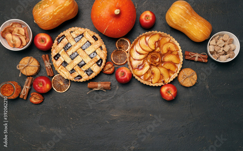 Berry tart pie and apple tart pie on black background