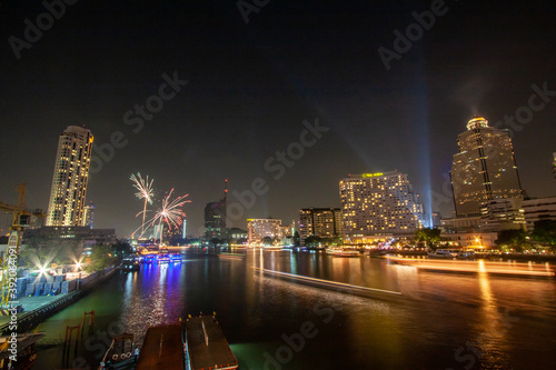 fireworks  Take photos of the night view of the city on New Year s Day with fireworks from a boat in the middle of the river