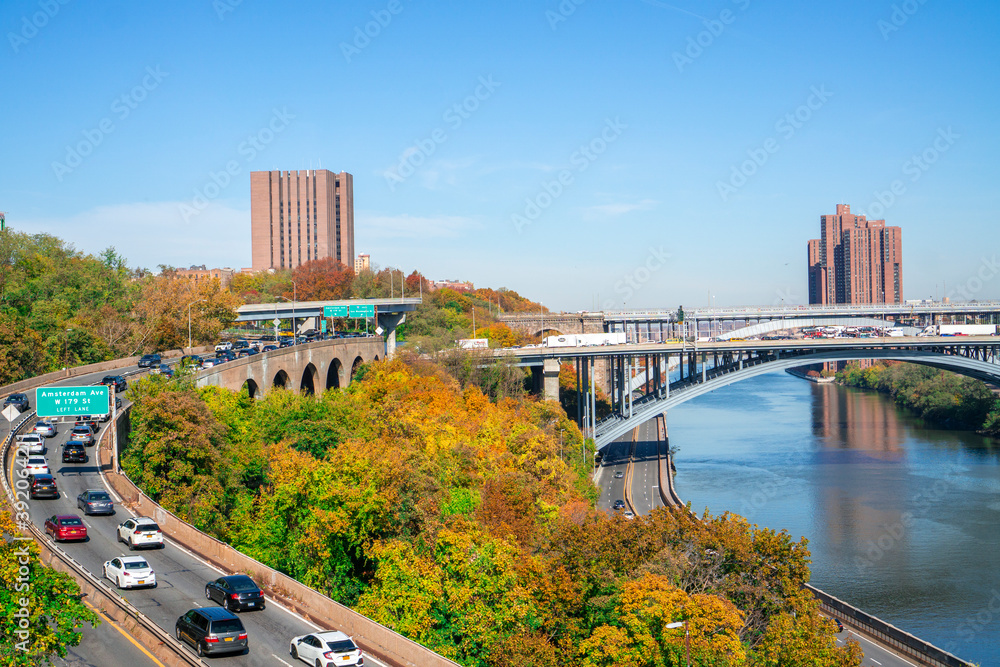 New York / USA - November 7 2020: The High Bridge with highway and colored trees during autumn season