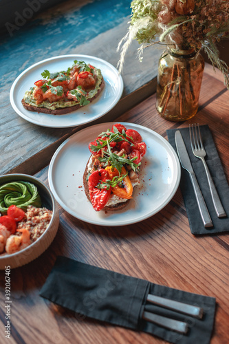 Appetizing bruschetta on a white plate. restaurant server