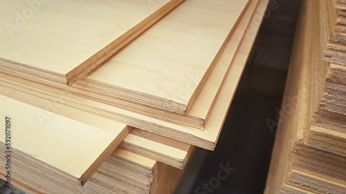 Plywood sheets in the store. Wooden panel stacked. Lumber is sold at the supermarket in the warehouse